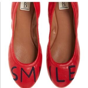 SMILE bright red flats by Ellen Degeneres. Used in good condition.